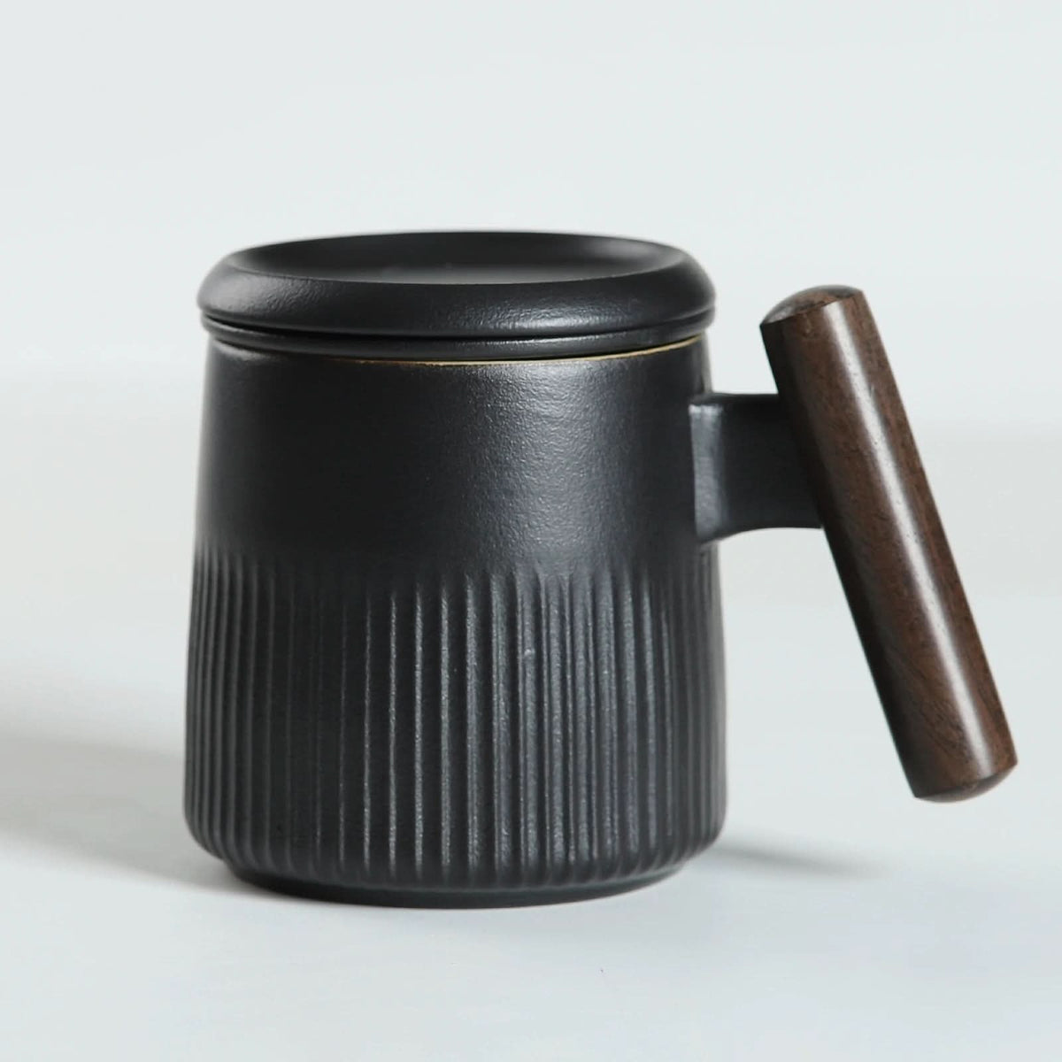 Taza de té de cerámica con infusor y embalaje en caja 