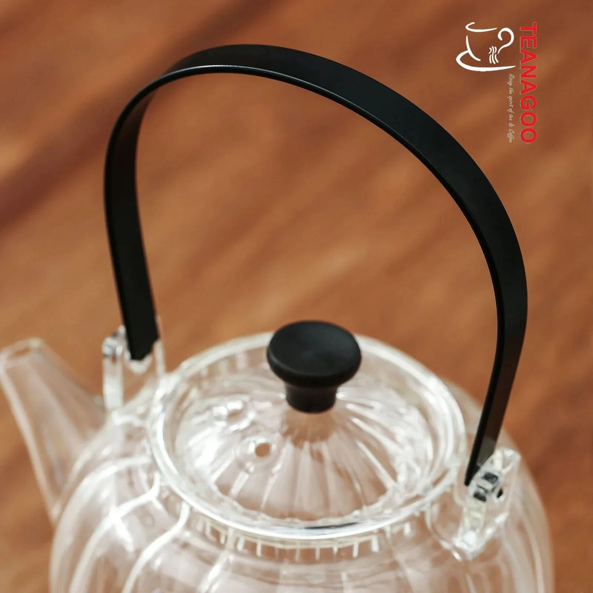 Pyrex teapot with glass infuser safe on stovetop to brew tea