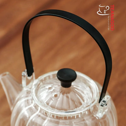 Pyrex teapot with glass infuser safe on stovetop to brew tea